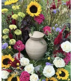 TRAY OF GARDEN FLOWERS FOR ANY URN. An arrangement by Flowers by Priscilla.