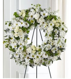 FTD Faithful Wished Wreath. An arrangement by Fendley Florists.