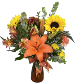 Golden Embrace Arrangement. An arrangement by Hills Valley Floral. Golden Embrace Arrangement. An arrangement by Hills Valley Floral.