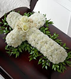 Peaceful Memories Casket Spray. An arrangement by Fendley Florists.