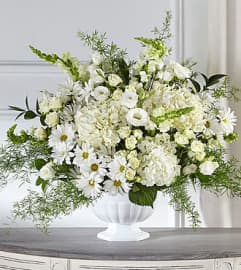 FTD Love and Compassion Arrangement. An arrangement by Fendley Florists.