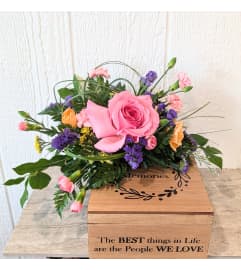 Memorial Keepsake box with flowers. An arrangement by Block Farms Flowers.