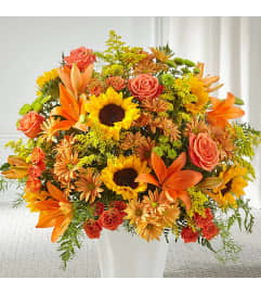 HARVEST SYMPATHY BASKET. An arrangement by J.D. Ballantine's Flowers and Gifts.