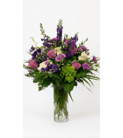 Impress Them. An arrangement by DMP Flowers and Gifts.