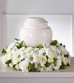 FTD Ivory Gardens Cremation Urn. An arrangement by Fendley Florists.