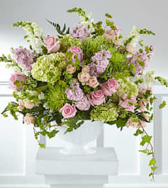 FTD Radiant Embrace Arrangement. An arrangement by Fendley Florists.