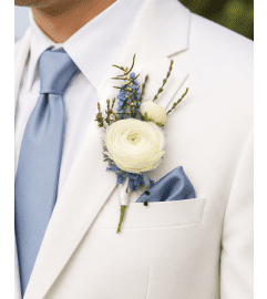 Pure Elegance Boutonniere. An arrangement by Floral Lady Design Studio LLC.