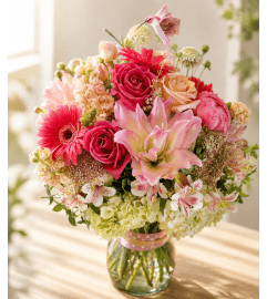 Blushing Lily and Rose Embrace. An arrangement by Floral Lady Design Studio LLC. Blushing Lily and Rose Embrace. An arrangement by Floral Lady Design Studio LLC.