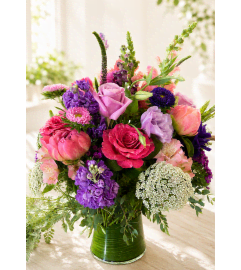 Purple Dream Garden. An arrangement by Floral Lady Design Studio LLC. Purple Dream Garden. An arrangement by Floral Lady Design Studio LLC.