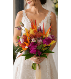 Tropical Radiance Bridal Bouquet. An arrangement by Floral Lady Design Studio LLC.