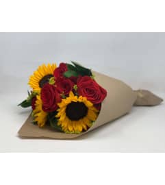 The Sunshine Handheld Bouquet. An arrangement by Fletcher Heights Florist.