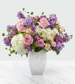 FTD Peace and Hope Lavender Bouquet. An arrangement by Fendley Florists.