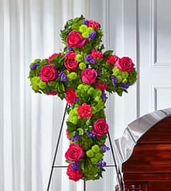 FTD Tribute Rose Floral Cross. An arrangement by Fendley Florists. FTD Tribute Rose Floral Cross. An arrangement by Fendley Florists.