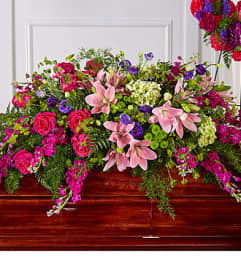 FTD Radiant Tribute Casket Spray. An arrangement by Fendley Florists. FTD Radiant Tribute Casket Spray. An arrangement by Fendley Florists.