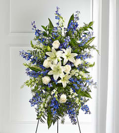FTD Faithful Friend Standing Spray. An arrangement by Fendley Florists. FTD Faithful Friend Standing Spray. An arrangement by Fendley Florists.