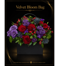Velvet Bloom Bag. An arrangement by New Britain Flower Shop.