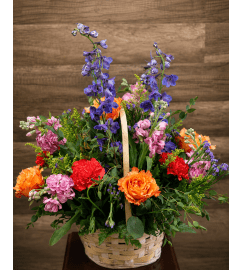 Colorful Day Basket. An arrangement by Sonia's Florist.