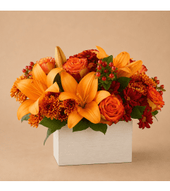 Radiant Ember Blossoms. An arrangement by Bill's Flowers Arrangements. Radiant Ember Blossoms. An arrangement by Bill's Flowers Arrangements.