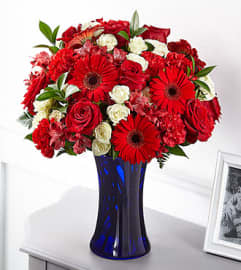 FTD Hearts Embrace Bouquet. An arrangement by Fendley Florists.