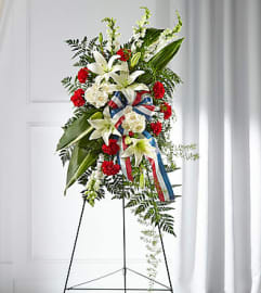 FTD Stars of Life Standing Spray. An arrangement by Fendley Florists.