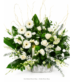 Pure Elegance Basket. An arrangement by New Britain Flower Shop.