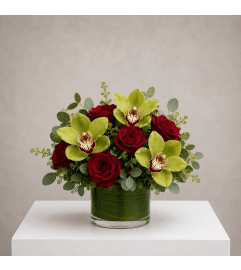Enchanted Rose and Orchid. An arrangement by Bill's Flowers Arrangements.