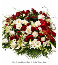 Forever in Love Casket Spray. An arrangement by Berlin Flower Shop.