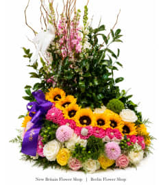 Heavenly Garden Tribute Cremation Ring. An arrangement by New Britain Flower Shop.