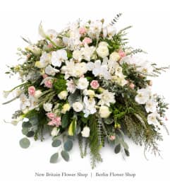 Angelic Elegance Casket Spray. An arrangement by Berlin Flower Shop.