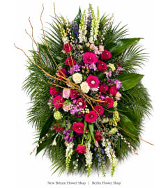 Vibrant Memories Standing Spray. An arrangement by New Britain Flower Shop.