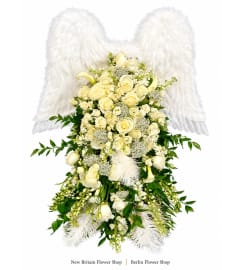 Heavenly Wings Floral Tribute. An arrangement by New Britain Flower Shop.