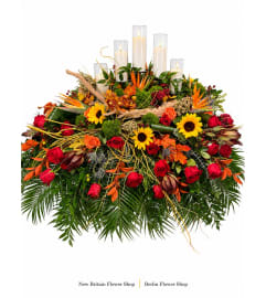 Autumn Light Casket Spray. An arrangement by New Britain Flower Shop.