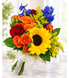 SUNFLOWER HAND HELD BOUQUET. An arrangement by Fink Flowers Gifts and Flower Delivery. SUNFLOWER HAND HELD BOUQUET. An arrangement by Fink Flowers Gifts and Flower Delivery.