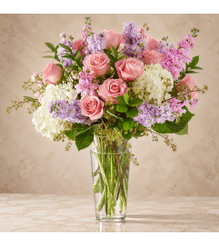 Embraced Bouquet. An arrangement by Bill's Flowers Arrangements.