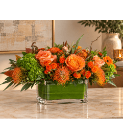 The Amberwood. An arrangement by Bill's Flowers Arrangements.