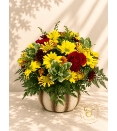 Harvest Glow by Floratechnics. An arrangement by Lori's Hearts and Flowers. Harvest Glow by Floratechnics. An arrangement by Lori's Hearts and Flowers.