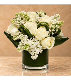 Dove. An arrangement by Bill's Flowers Arrangements. Dove. An arrangement by Bill's Flowers Arrangements.