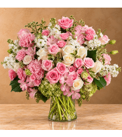 Roses in the Sun. An arrangement by Bill's Flowers Arrangements. Roses in the Sun. An arrangement by Bill's Flowers Arrangements.