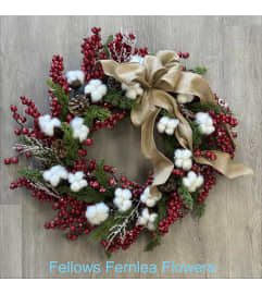 Wreath with Winter Berries and Spruce - Faux. An arrangement by Fellows Fernlea Flowers.