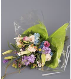 Expressions Seasonal Hand Tied Bouquet. An arrangement by Floral Expressions and Gifts Inc..