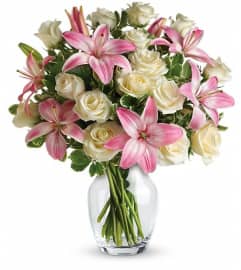 Always a Lady. An arrangement by Margaret's Florist.