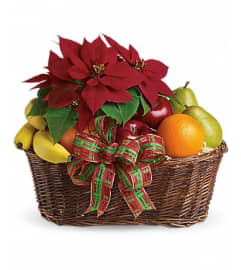 Fruits and Poinsetta. An arrangement by Top Flower Designers.