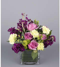 Purple Passion Cube. An arrangement by Floral Expressions and Gifts Inc..