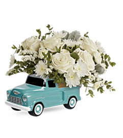 The Teleflora's Classic Chevy Pickup Bouquet. An arrangement by Marivel's Florist and Gifts.