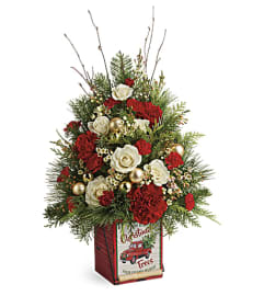 Teleflora's Vintage Greetings Tree. An arrangement by Artistic Way Flowers.