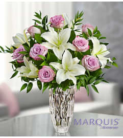 Marquis by Waterford® Purple Rose and Lily. An arrangement by Blessing and Blooms Florist.