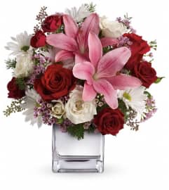 Teleflora's Happy in Love Bouquet. An arrangement by Pompano Beach Floral.