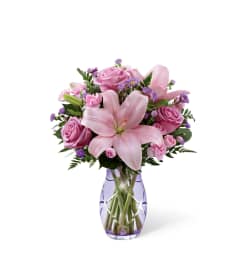 The FTD® Graceful Wonder™ Bouquet. An arrangement by Mystic Garden Floral.