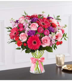 Radiant Rhapsody™ Bouquet. An arrangement by Graceland Florist.