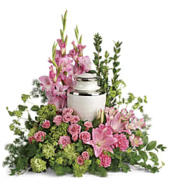 Sacred Solace Cremation Tribute. An arrangement by Marivel's Florist and Gifts. Sacred Solace Cremation Tribute. An arrangement by Marivel's Florist and Gifts.